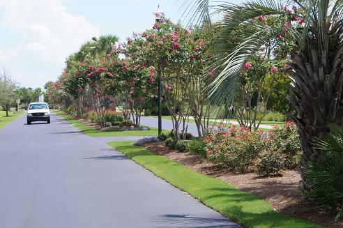 Landscaped entrance to a gated condominium complex at Litchfield.