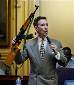 Fighting Joe -- showboating with an assault rifle in the General Assembly.