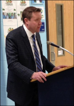 Corey Stewart struggles to be heard.
