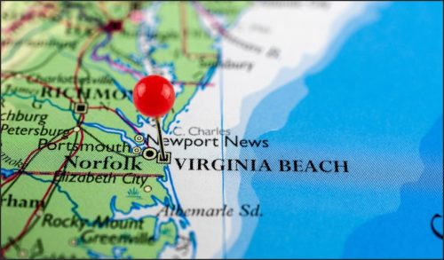 A close-up of a map highlighting Norfolk and Virginia Beach in Virginia, with a red pin marking the location.