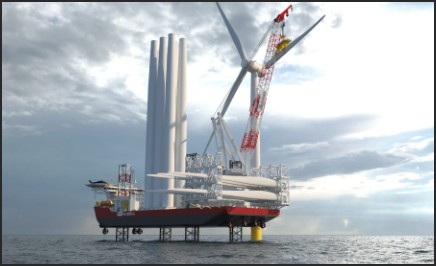 A large offshore wind turbine installation platform with a crane and multiple turbine components visible against a cloudy sky over the ocean.