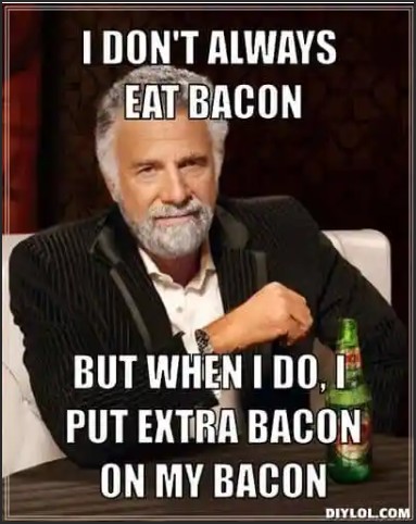 A humorous image featuring a man with a beard in a black suit, sitting at a table holding a beer bottle. The text reads: 'I DON'T ALWAYS EAT BACON, BUT WHEN I DO, I PUT EXTRA BACON ON MY BACON.'