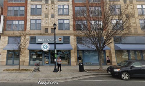 Exterior view of a UPS Store located at 1405 South Fern Street in Arlington, Virginia, featuring signage and nearby street elements.