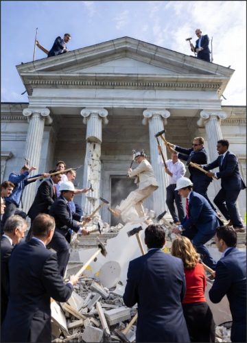 A group of individuals in formal attire and hard hats are demolishing a crumbling building, with one person in a suit seemingly caught in the chaos amid falling debris.