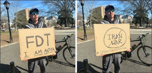 Man holding a cardboard sign that reads 'FDT I AM ANTIFA' in a park setting.