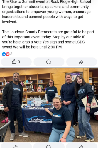 Group of individuals participating in the Rise to Summit event at Rock Ridge High School, promoting empowerment and leadership for young women. The Loudoun County Democrats are present, encouraging voter engagement with informational materials and merchandise.